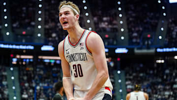 Feb 26, 2025; Hartford, Connecticut, USA; UConn Huskies forward Liam McNeeley (30) reacts after a play against the Georgetown Hoyas in the second half at XL Center. Mandatory Credit: David Butler II-Imagn Images