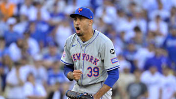 Oct 14, 2024; Los Angeles, California, USA; New York Mets pitcher Edwin Diaz (39) celebrates after defeating the Los Angeles Dodgers in game two of the NLCS for the 2024 MLB Playoffs at Dodger Stadium. Mandatory Credit: Jayne Kamin-Oncea-Imagn Images