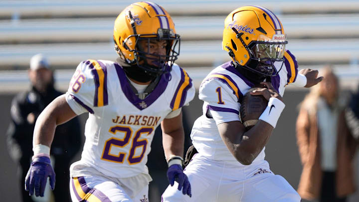 Dec 6, 2024; Birmingham, AL, USA; Jackson's Landon Duckworth (1) runs the ball against Cherokee County at Protective Stadium in the AHSAA 4A State Championship game.