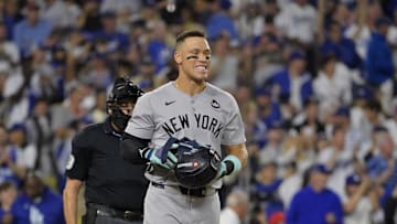 Oct 26, 2024; Los Angeles, California, USA; New York Yankees outfielder Aaron Judge (99) reacts after striking out in the sixth inning against the Los Angeles Dodgers during game two of the 2024 MLB World Series at Dodger Stadium. Mandatory Credit: Jayne Kamin-Oncea-Imagn Images