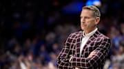 Alabama head coach Nate Oats works with his team against Kentucky during the first half of a Southeastern Conference tournament quarterfinal game at Bridgestone Arena in Nashville, Tenn., Friday, March 14, 2025.
