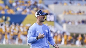 Sep 13, 2025; Morgantown, West Virginia, USA; West Virginia Mountaineers defensive coordinator  Zac Alley reacts during the third quarter against the Pittsburgh Panthers at Milan Puskar Stadium. Mandatory Credit: Ben Queen-Imagn Images
