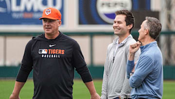 Detroit Tigers manager A.J. Hinch, left, talks to president of baseball operation Scott Harris, center, and team owner Chris Ilitch during spring training at Joker Marchant Stadium in Lakeland, Fla. on Thursday, Feb. 20, 2025.