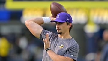 Oct 23, 2025; Inglewood, California, USA;  Minnesota Vikings quarterback Max Brosmer (12) warms up prior to the game against the Los Angeles Chargers at SoFi Stadium. Mandatory Credit: Jayne Kamin-Oncea-Imagn Images