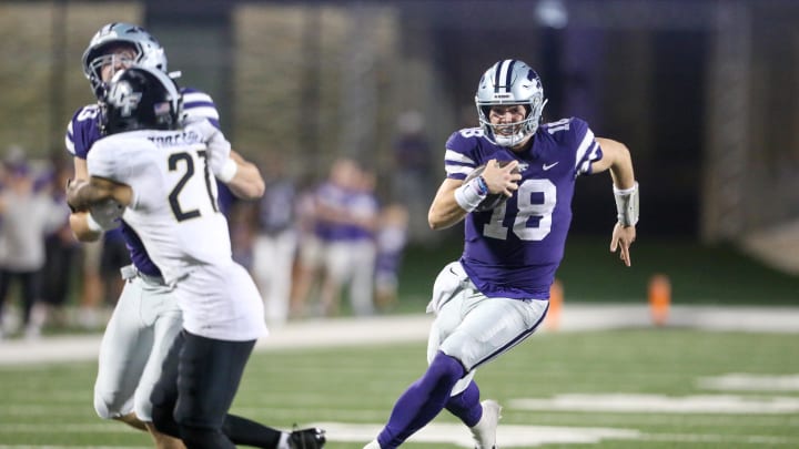 Sep 23, 2023; Manhattan, Kansas, USA; Kansas State Wildcats quarterback Will Howard (18) follows the block of tight end Will Swanson (83) during the fourth quarter against the UCF Knights at Bill Snyder Family Football Stadium. Mandatory Credit: Scott Sewell-USA TODAY Sports