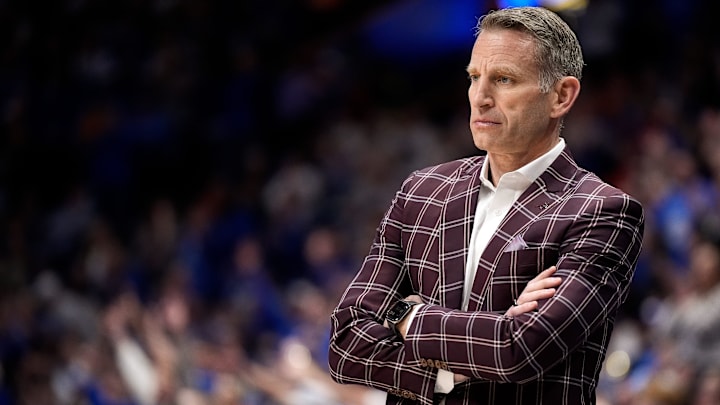 Alabama head coach Nate Oats works with his team against Kentucky during the first half of a Southeastern Conference tournament quarterfinal game at Bridgestone Arena in Nashville, Tenn., Friday, March 14, 2025.