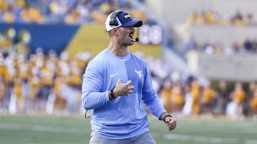 Sep 13, 2025; Morgantown, West Virginia, USA; West Virginia Mountaineers defensive coordinator  Zac Alley reacts during the third quarter against the Pittsburgh Panthers at Milan Puskar Stadium. Mandatory Credit: Ben Queen-Imagn Images