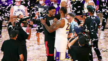 Oct 11, 2020; Lake Buena Vista, Florida, USA; Los Angeles Lakers forward LeBron James (23) hugs Miami Heat forward Udonis Haslem (40) after game six of the 2020 NBA Finals at AdventHealth Arena. The Los Angeles Lakers won 106-93 to win the series. Mandatory Credit: Kim Klement-USA TODAY Sports