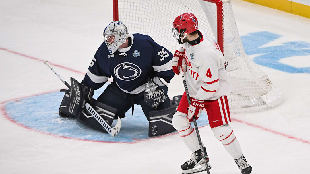 Apr 10, 2025; St. Louis, Missouri, UNITED STATES; Penn State Nittany Lions goaltender Arsenii Sergeev (35) defends the net agent the Boston University Terriers during the first period of the Frozen Four college ice hockey national semifinals at Enterprise Center. Mandatory Credit: Connor Hamilton-Imagn Images