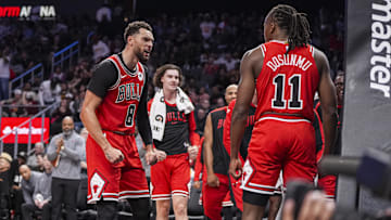 Nov 9, 2024; Atlanta, Georgia, USA; Chicago Bulls guard Zach LaVine (8) reacts after guard Ayo Dosunmu (11) scored a basket