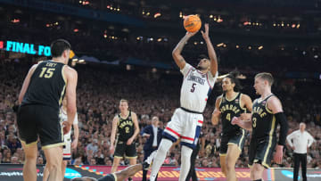 Apr 8, 2024; Glendale, AZ, USA;  Connecticut Huskies guard Stephon Castle (5) shoots against the Purdue Boilermakers in the national championship game of the Final Four of the 2024 NCAA Tournament at State Farm Stadium. Mandatory Credit: Robert Deutsch-USA TODAY Sports