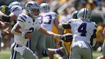 Oct 4, 2025; Waco, Texas, USA;  Kansas State Wildcats quarterback Avery Johnson (2) hands the ball to running back Joe Jackson (4) against the Baylor Bears during the second half at McLane Stadium. Mandatory Credit: Chris Jones-Imagn Images