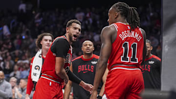 Nov 9, 2024; Atlanta, Georgia, USA; Chicago Bulls guard Zach LaVine (8) reacts after guard Ayo Dosunmu (11) scored a basket against the Atlanta Hawks during the second half at State Farm Arena. Mandatory Credit: Dale Zanine-Imagn Images
