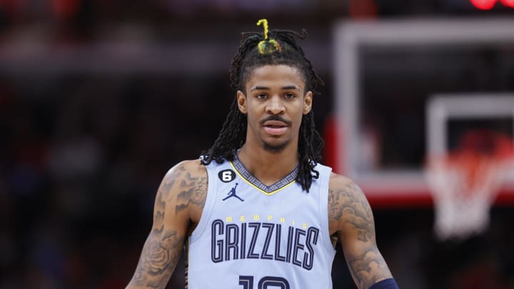 Apr 2, 2023; Chicago, Illinois, USA; Memphis Grizzlies guard Ja Morant (12) looks on during the second half of an NBA game against the Chicago Bulls at United Center. Mandatory Credit: Kamil Krzaczynski-USA TODAY Sports