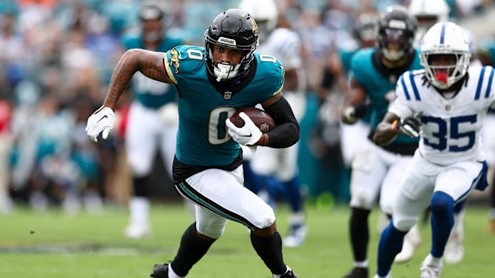 Oct 6, 2024; Jacksonville, Florida, USA; Jacksonville Jaguars wide receiver Gabe Davis (0) runs with the ball against the Indianapolis Colts in the second quarter at EverBank Stadium. Mandatory Credit: Nathan Ray Seebeck-Imagn Images