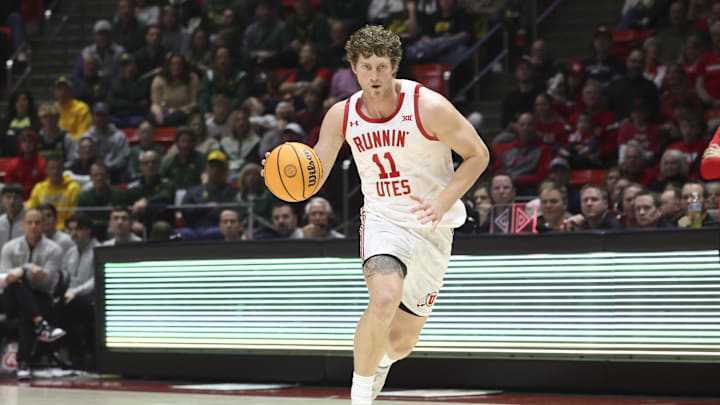Jan 25, 2025; Salt Lake City, Utah, USA; Utah Utes forward Caleb Lohner (11) dribbles with the ball against the Baylor Bears during the second half at Jon M. Huntsman Center. Mandatory Credit: Rob Gray-Imagn Images Jan 25, 2025; Salt Lake City, Utah, USA; Utah Utes forward Caleb Lohner (11) dribbles with the ball against the Baylor Bears during the second half at Jon M. Huntsman Center. Mandatory Credit: Rob Gray-Imagn Images