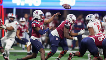 South Carolina State Bulldogs quarterback Eric Phoenix (7) throws a pass against the Jackson State Tigers in the fourth quarter of the Cricket Celebration Bowl. 
