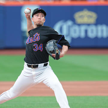 Jul 26, 2024; New York City, New York, USA; New York Mets starting pitcher Kodai Senga (34) delivers a pitch during the first inning against the Atlanta Braves at Citi Field. Mandatory Credit: Vincent Carchietta-Imagn Images