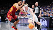 Brigham Young forward Richie Saunders (15) drives to the basket around Iowa State forward Joshua Jefferson (2) during the first half at T-Mobile Center in Thursday's Big 12 Tournament quarterfinals.