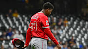 Sep 17, 2025; Milwaukee, Wisconsin, USA; Los Angeles Angels starting pitcher Jose Soriano (59) reacts after getting hit by a ball hit by Milwaukee Brewers first baseman Jake Bauers (not pictured) in the second inning at American Family Field. Mandatory Credit: Benny Sieu-Imagn Images