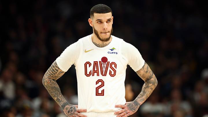 Jan 30, 2026; Phoenix, Arizona, USA; Cleveland Cavaliers guard Lonzo Ball (2) against the Phoenix Suns at Mortgage Matchup Center. Mandatory Credit: Mark J. Rebilas-Imagn Images