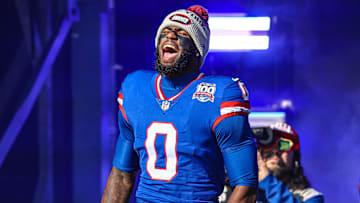 Nov 3, 2024; East Rutherford, New Jersey, USA;  New York Giants linebacker Brian Burns (0) reacts during introductions before the game against the Washington Commanders at MetLife Stadium. Mandatory Credit: Vincent Carchietta-Imagn Images
