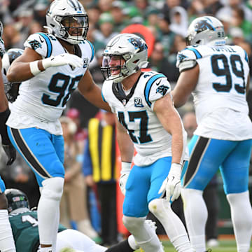 Dec 8, 2024; Philadelphia, Pennsylvania, USA; Carolina Panthers linebacker Josey Jewell (47) reacts after sacking Philadelphia Eagles quarterback Jalen Hurts (1) during the first quarter at Lincoln Financial Field. Mandatory Credit: Eric Hartline-Imagn Images