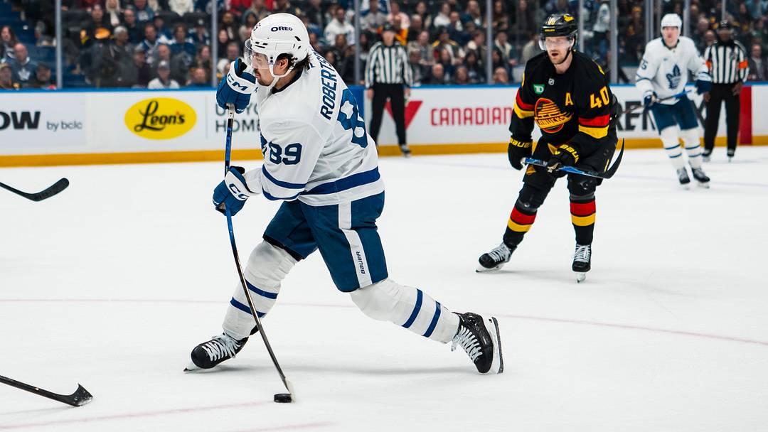 Jan 31, 2026; Vancouver, British Columbia, CAN; Toronto Maple Leafs forward Nicholas Robertson (89) shoots against the Vancouver Canucks in the third period at Rogers Arena. Mandatory Credit: Bob Frid-Imagn Images