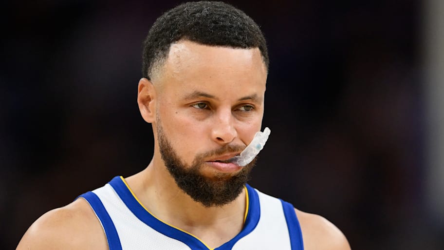 Steph Curry chewing his mouthguard.