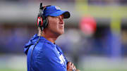 Kansas Jayhawks head coach Lance Leipold watches the scoreboard during the game between Fresno State and Kansas at David Booth Kansas Memorial Stadium on Aug. 23, 2025.