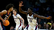 Gonzaga Bulldogs forward Graham Ike (13) defends Georgia Bulldogs forward Asa Newell (14) in the first half of a first round men’s NCAA Tournament game at Intrust Bank Arena