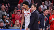 Jan 11, 2025; New York, New York, USA;  St. John's Red Storm head coach Rick Pitino greets guard RJ Luis Jr. (12) as he comes out of the game in the second half against the Villanova Wildcats at Madison Square Garden. Mandatory Credit: Wendell Cruz-Imagn Images