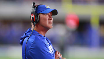 Kansas Jayhawks head coach Lance Leipold watches the scoreboard during the game between Fresno State and Kansas at David Booth Kansas Memorial Stadium on Aug. 23, 2025.