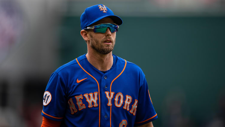 New York Mets left fielder Jeff McNeil (6) looks on.