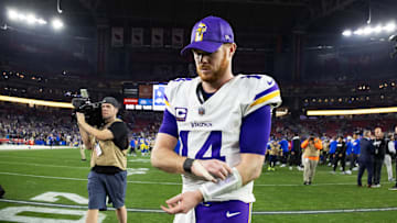 Jan 13, 2025; Glendale, AZ, USA; Minnesota Vikings quarterback Sam Darnold (14) reacts as he walks off the field after losing to the Los Angeles Rams during an NFC wild card game at State Farm Stadium. Mandatory Credit: Mark J. Rebilas-Imagn Images