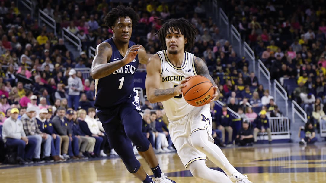Feb 5, 2026; Ann Arbor, Michigan, USA;  Michigan Wolverines guard Elliot Cadeau (3) dribbles against Penn State Nittany Lions forward Mason Blackwood (1) in the first half at Crisler Center. Mandatory Credit: Rick Osentoski-Imagn Images