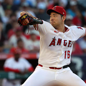 Aug 4, 2025; Anaheim, California, USA;  Los Angeles Angels starting pitcher Yusei Kikuchi (16) pitches during the second inning against the Tampa Bay Rays at Angel Stadium. Mandatory Credit: Kiyoshi Mio-Imagn Images