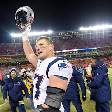 Jan 20, 2019; Kansas City, MO, USA; New England Patriots tight end Rob Gronkowski (87) celebrates the win over the Kansas City Chiefs during overtime in the AFC Championship game at Arrowhead Stadium. Mandatory Credit: Kirby Lee-Imagn Images
