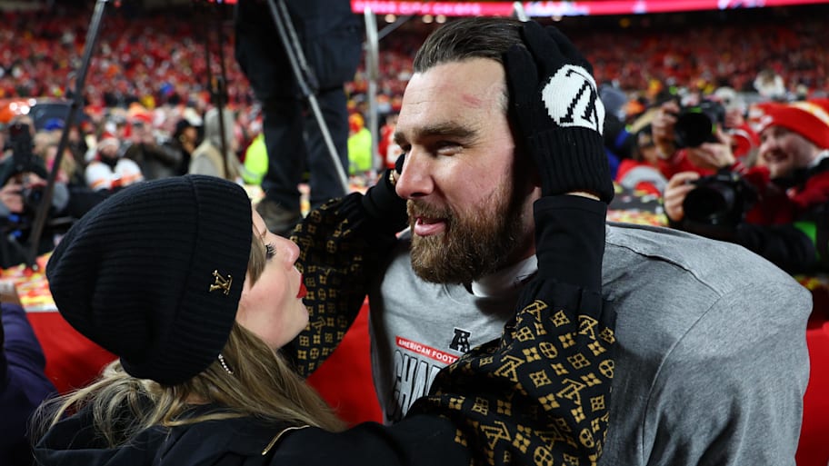 Taylor Swift (left) and Travis Kelce (right) embrace after the AFC championship. | Mark J. Rebilas-Imagn Images