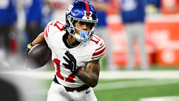 Nov 23, 2025; Detroit, Michigan, USA; New York Giants wide receiver Wan'Dale Robinson (17) runs upfield after catching a swing pass in the second quarter against the Detroit Lions at Ford Field. 