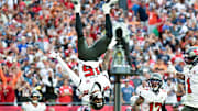 Nov 9, 2025; Tampa, Florida, USA; Tampa Bay Buccaneers wide receiver Tez Johnson (15) flips while celebrating a touchdown during the third quarter against the New England Patriots at Raymond James Stadium. Mandatory Credit: Jonathan Dyer-Imagn Images