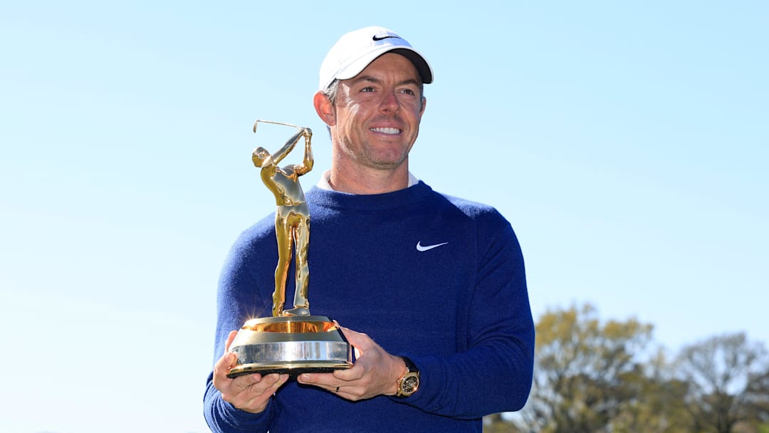 Rory McIlroy poses with the winning trophy after winning the 2025 edition of The Players Championship