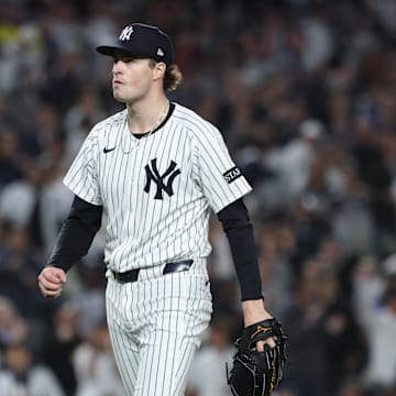 Oct 2, 2025; Bronx, New York, USA; New York Yankees pitcher Cam Schlittler (31) walks of the field after pitching the top of the sixth inning against the Boston Red Sox during game three of the Wildcard round for the 2025 MLB playoffs at Yankee Stadium. Mandatory Credit: Vincent Carchietta-Imagn Images