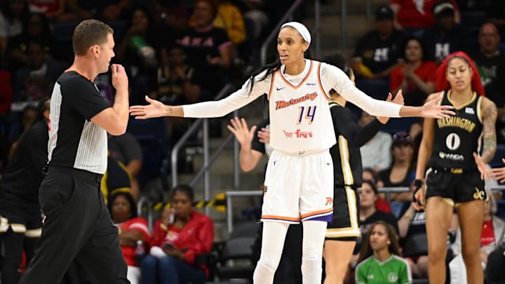 Sep 4, 2025; Washington, District of Columbia, USA;  Phoenix Mercury forward DeWanna Bonner (14) complains about a foul call against the Washington Mystics during the first quarter at CareFirst Arena. Mandatory Credit: Rafael Suanes-Imagn Images
