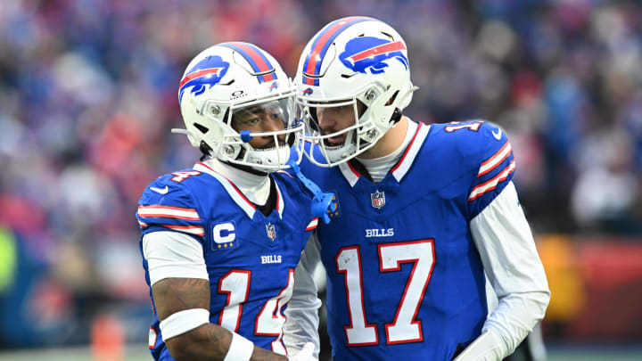 Dec 31, 2023; Orchard Park, New York, USA; Buffalo Bills quarterback Josh Allen (17) has a word with wide receiver Stefon Diggs (14) between plays in the third quarter game against the New England Patriots at Highmark Stadium. Mandatory Credit: Mark Konezny-USA TODAY Sports