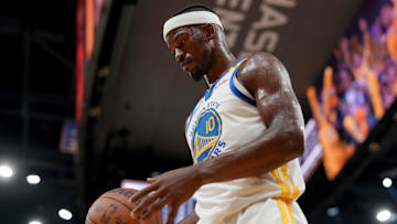 Apr 15, 2025; San Francisco, California, USA; Golden State Warriors forward Jimmy Butler III (10) holds onto the ball against the Memphis Grizzlies during a timeout in the third quarter at the Chase Center. Mandatory Credit: Cary Edmondson-Imagn Images