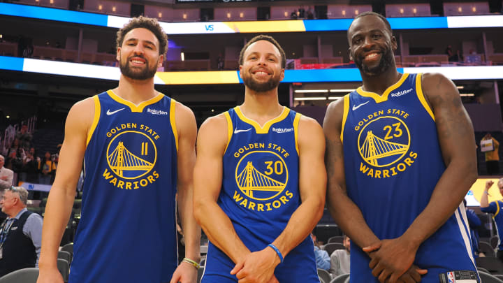 Nov 30, 2023; San Francisco, California, USA; Golden State Warriors guard Klay Thompson (11), guard Stephen Curry (30) and forward Draymond Green (23) after the game against the Los Angeles Clippers at Chase Center. Mandatory Credit: Kelley L Cox-USA TODAY Sports