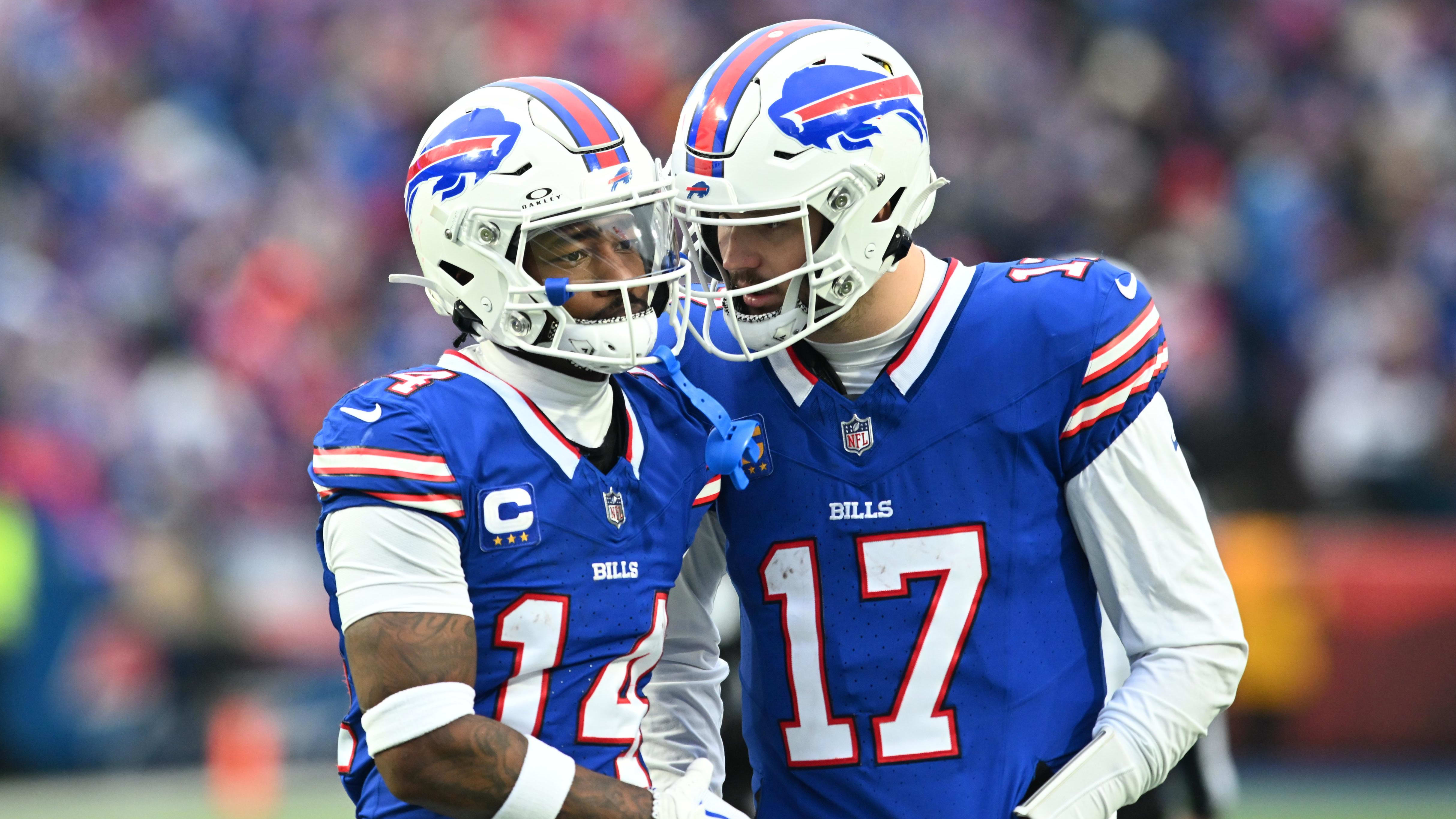 Bills quarterback Josh Allen talks with receiver Stefon Diggs.