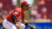 Jul 13, 2025; Cincinnati, Ohio, USA; Cincinnati Reds third baseman Santiago Espinal (4) prepares for the pitch in the sixth inning against the Colorado Rockies at Great American Ball Park. Mandatory Credit: Katie Stratman-Imagn Images