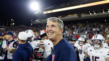 Nov 28, 2025; Tempe, Arizona, USA; Arizona Wildcats head coach Brent Brennan celebrates against the Arizona State Sun Devils during the 99th Territorial Cup at Mountain America Stadium. Mandatory Credit: Mark J. Rebilas-Imagn Images
